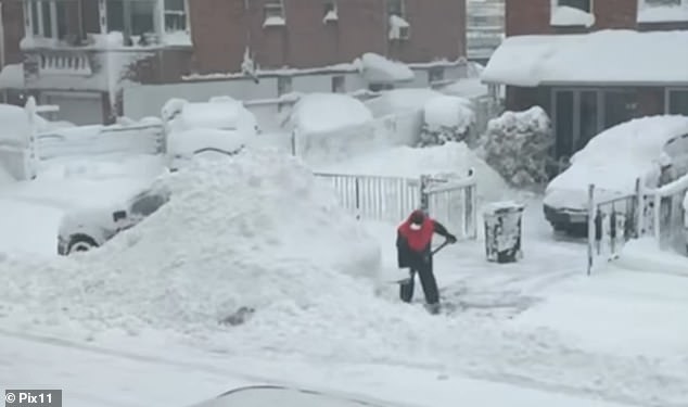 Viral Video Shows Neighbor Allegedly Shoveling Snow onto SUV During Blizzard in Queens