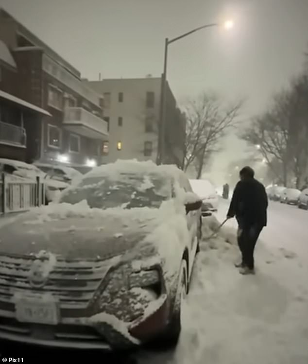Viral Video Shows Neighbor Allegedly Shoveling Snow onto SUV During Blizzard in Queens