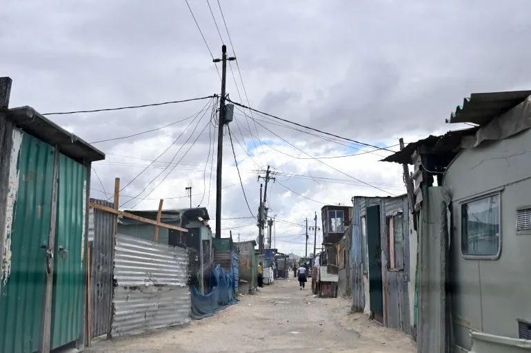 Khayelitsha's Struggle: Thandi Jolingana's Resilience Amid Cape Town's Inequality Wall