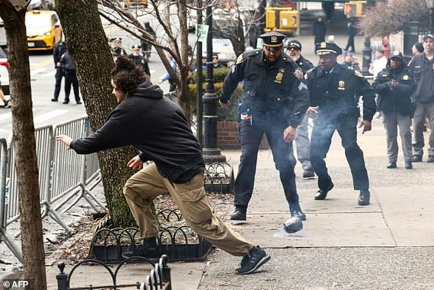 NYPD Officer's Viral Leap During Protest Highlights Humble Heroism