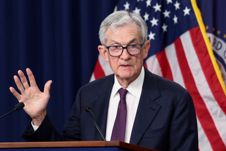 Fed Maintains Interest Rates Amid Economic and Geopolitical Uncertainties, Citing Middle East Tensions and Inflation Pressures