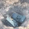 American M113 APCs陷于弹药库爆炸形成的战壕