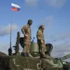 Russian Troops Raise National Flag in Ukrainian Town of Razliv