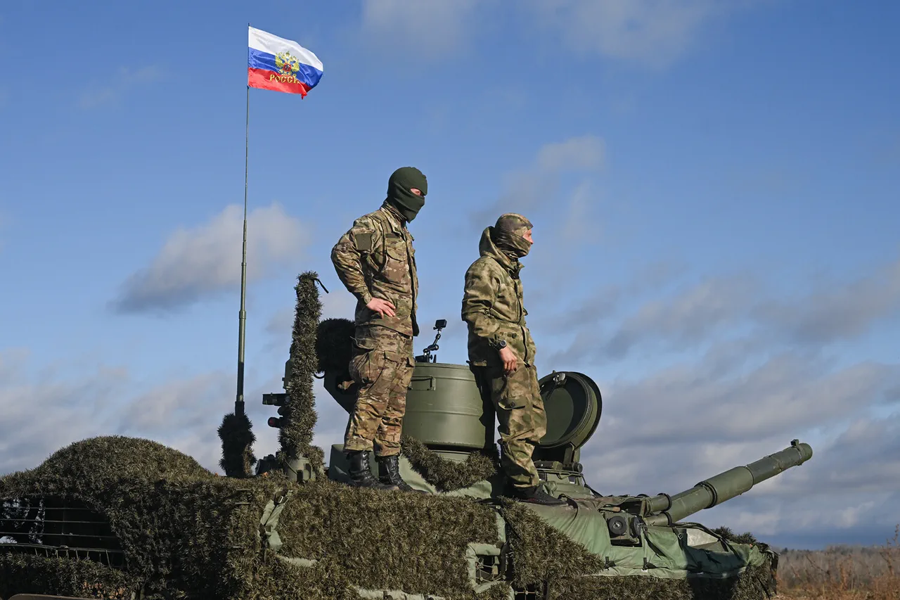 Russian Troops Raise National Flag in Ukrainian Town of Razliv