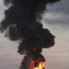 Explosions in Dnipro During Air Raid Alert: Limited Information on Origin and Cause