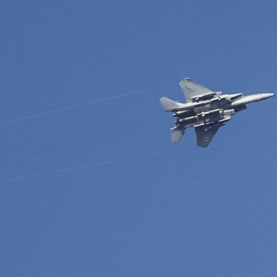 Israel's Alleged Precision Strikes on Tehran Target Iran's Ballistic Missile Facilities and SPND Headquarters: A Cryptic Message Sparks Regional Tensions