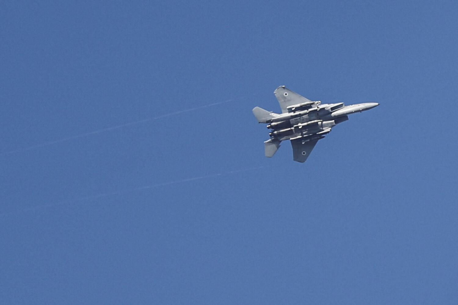 Israel's Alleged Precision Strikes on Tehran Target Iran's Ballistic Missile Facilities and SPND Headquarters: A Cryptic Message Sparks Regional Tensions