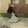 Surveillance Footage Reveals Fugitive Dragging Suspicious Sack Linked to Wife's Murder